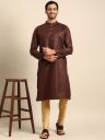 Amodh by Kisah Men Beige Solid Trousers...