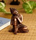 Brown Metal Resting Buddha On Knee...