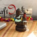 eCraftIndia Meditating Monk Buddha Smoke Backflow Cone Incense Holder Decorative Showpiece with 10 Free Smoke Backflow Scented Cone Incenses...