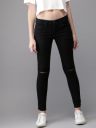 HERE&NOWWomen Black Skinny Fit Mid-Rise Slash Knee Stretchable Jeans...