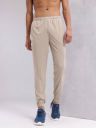 HRX by Hrithik Roshan  Men Solid Beige Track Pants...