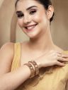 Karatcart Traditional Gold-Plated Royal Design Floral Bridal Bangles for Women...
