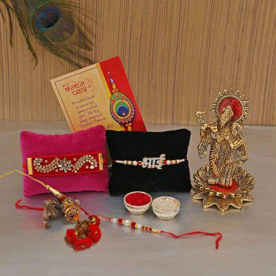 Rakhi Gift for Brother and Bhabhi (Contents: Radha Krishna Idol, Peacock Rakhi, Rakhi, Lumba Rakhi, Greeting Card)