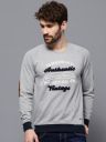 Roadster Grey Melange Flock Print T-shirt with Elbow Patch...