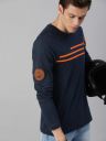 Roadster Men Navy Blue & Orange Striped Round Neck T-shirt...