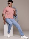 Roadster Men Solid Round Neck Cotton Blend Pink T-Shirt...