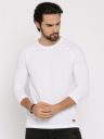 Roadster Men White Solid T-shirt with Raglan Sleeves...