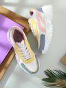 RoadsterWomen White and Yellow Colourblocked Synthetic Leather Sneakers...