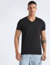 TOMMY HILFIGER  Men Solid Round Neck Cotton Blend Black T-Shirt...