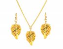 VAMA FASHIONS Antique Gold Oxidised Chain Pendant Earing Set...