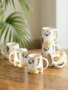 ExclusiveLane White & Yellow 6 Pieces Floral Printed Ceramic Glossy Cups 260 ml...