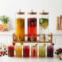 3 Tank Glass Beverage Dispenser Set with Wooden Stand | 2L Each Juice Dispenser with Tap & Lid + 6 Color Handle Glass Mugs (240ML) | Premium Drink Server for Lemonade, Parties & Home Use...