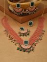 Zaveri PearlsGold-Plated & Peach-Coloured Stone-Studded Pearl Beaded Jewellery Set...